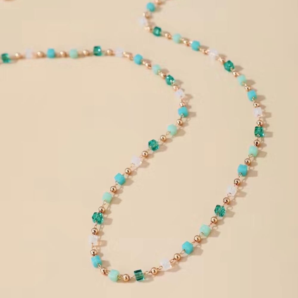Hand beaded necklace with crystal beads to 13-17”